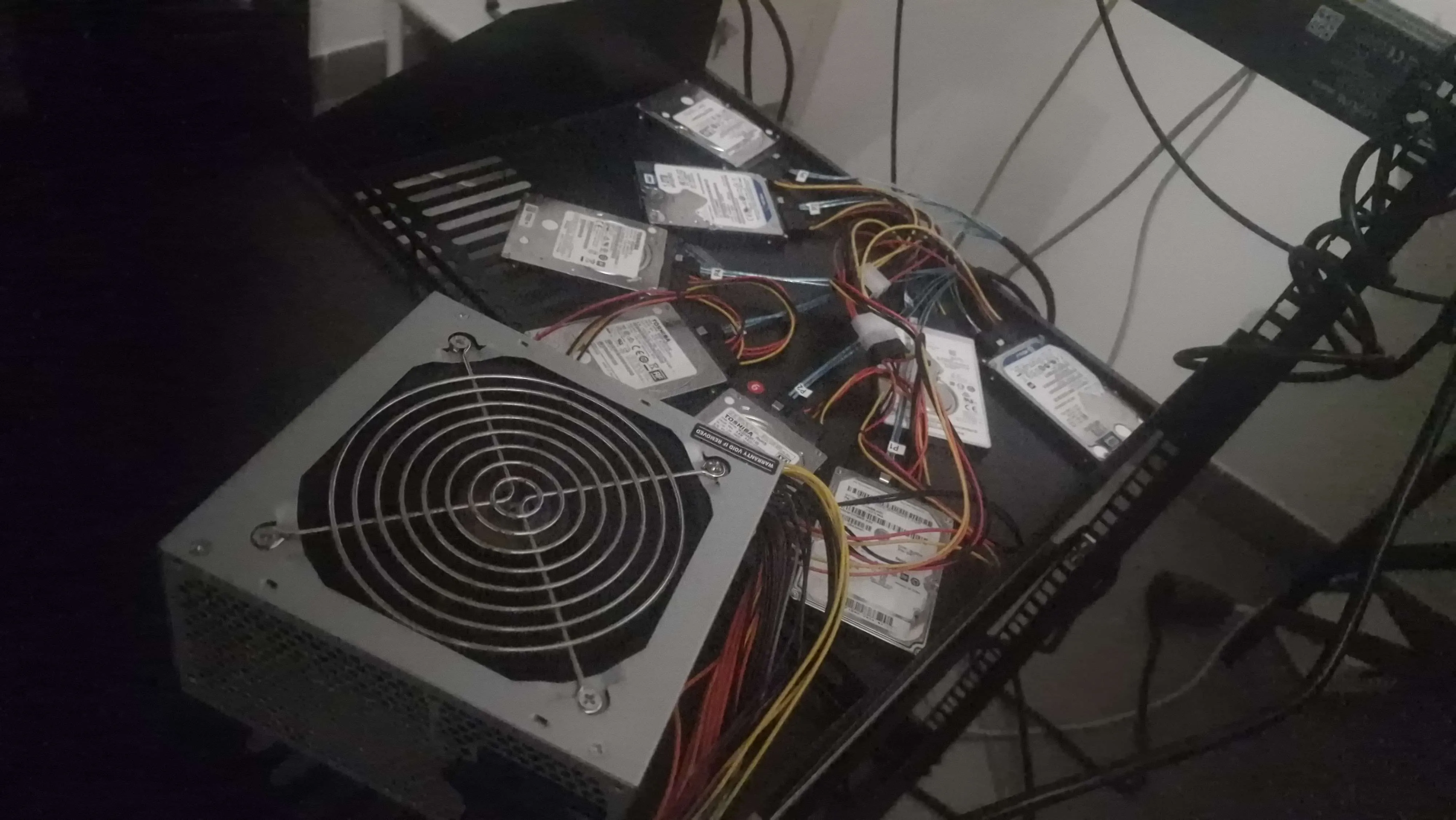 Extra disks sitting on top of the server case